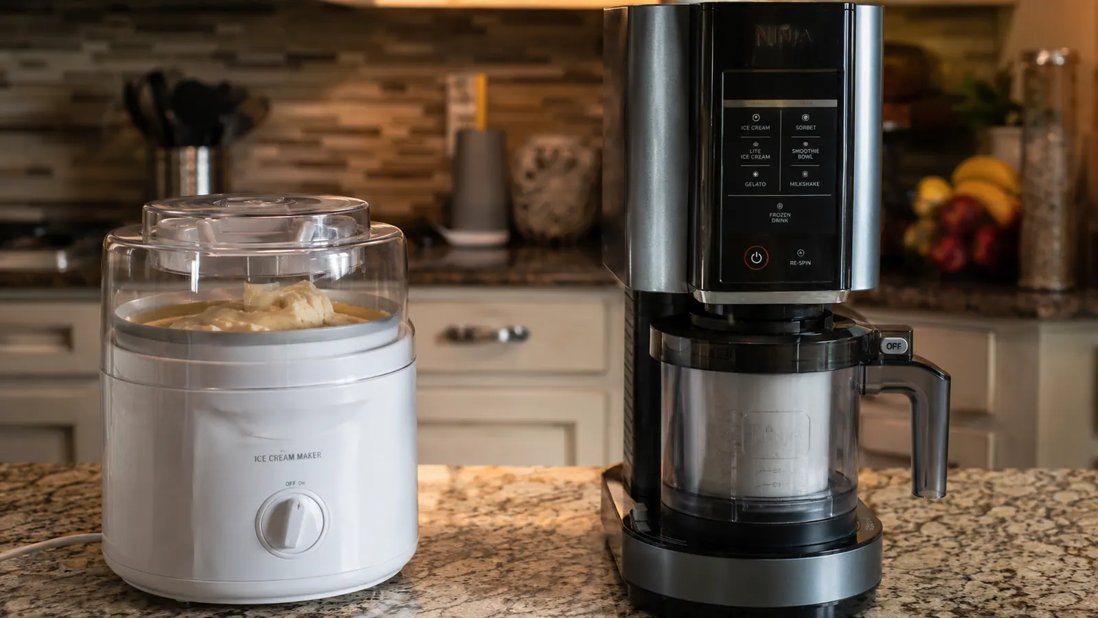 Cuisinart ICE-21P1 ice cream maker churning on a kitchen counter next to a boxy Ninja CREAMi unit